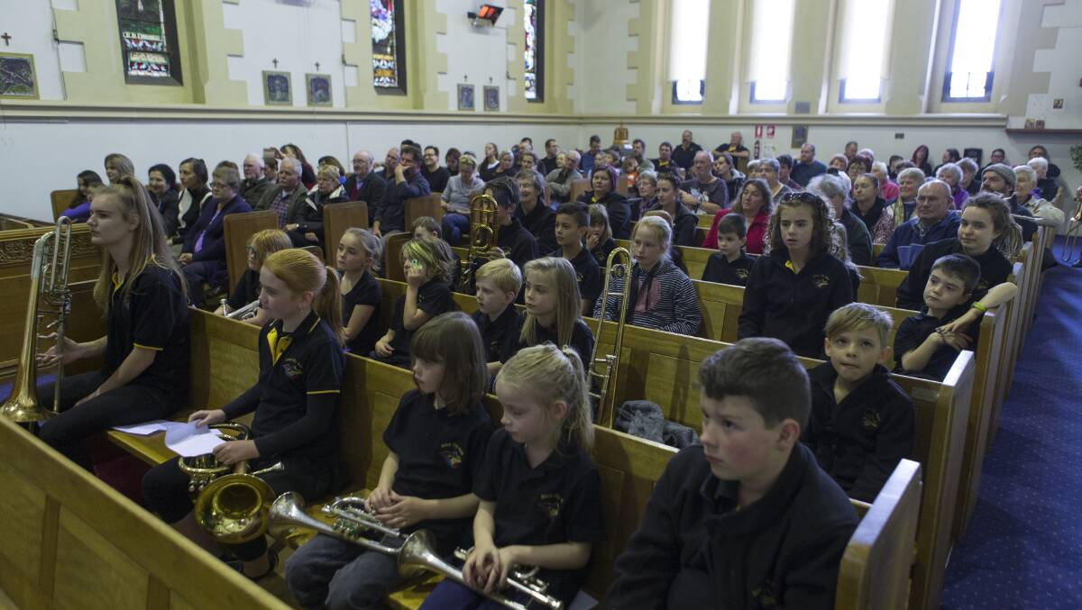 A captivated audience and performers wait their turn at the Solo Brass Showcase. Picture: Peter Pickering. 