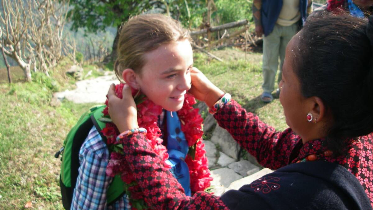 Big heart: Summer Merrick on a trip to a Nepalese community where she delivered funds for their community centre after her community fundraising efforts.