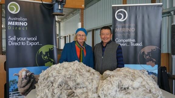 Fleece inspection: Australian Superfine Wool Growers Association's fleece competition and reunion attendees Susan Rowbottom and Mike Kuritani. Picture: provided. 