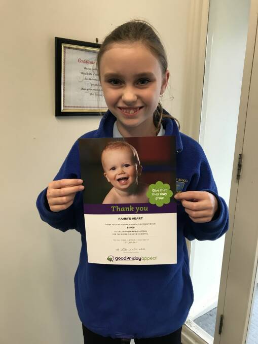 THANKFUL: Rahni Cooper with the thank you certificate she received for her donation to the Good Friday Appeal after fundraising in the community. PHOTO: Provided. 