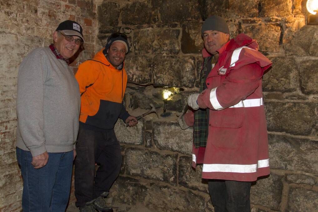 NO SECRETS: J Ward president Ken Ritchie with Ballarat stonemasons Paul Middleton and Carl Valerio. PHOTO: Peter Pickering. 