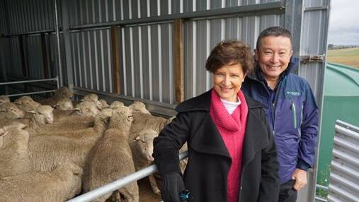 All smiles: Attendees of the Australian Superfine Wool Growers Association fleece competition and reunion, Brenda McGahan and Mike Kuritani pose at the event. Picture: provided. 