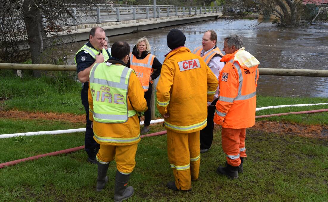 HELPING HANDS: All emergency service organisations joined local communities to fight rising water levels during the recent floods.