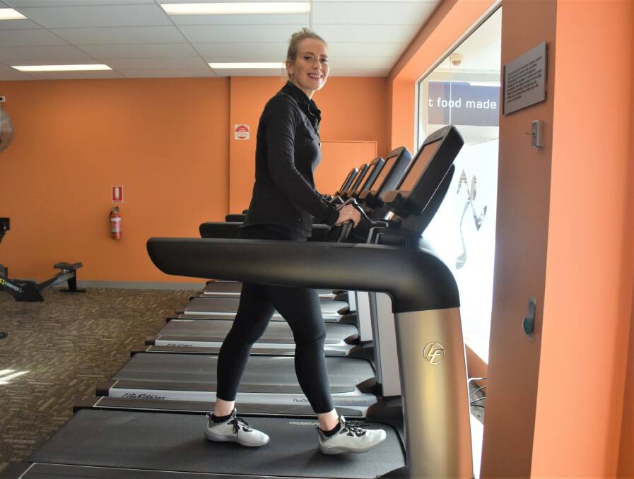 STEP UP AND RUN: Leah Dumesny gets on the treadmill to help raise awareness and funds for Suicide Prevention Australia. Picture: DAINA OLIVER