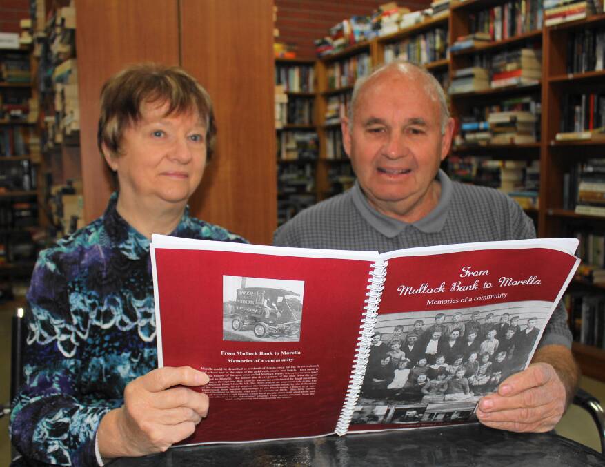 Robin Powell and Marion McAdie examine the final draft of the book on Morella. Picture: Contributed