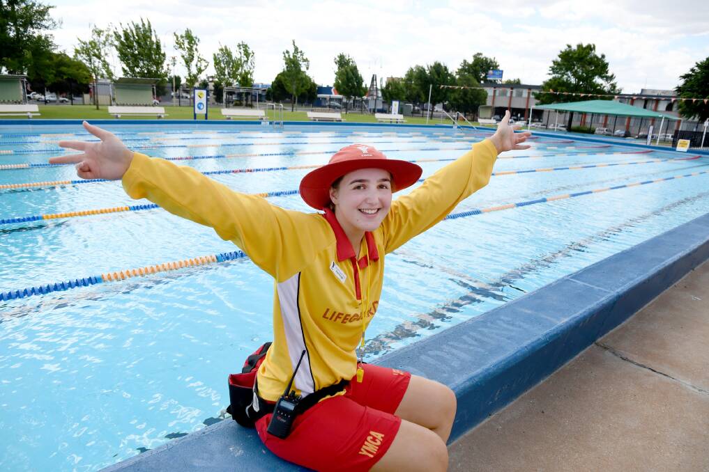 Horsham Aquatic Centre lifeguard Ashleigh Sorrell gets ready for summer with the outside pool now open. Picture: Samantha Camarri