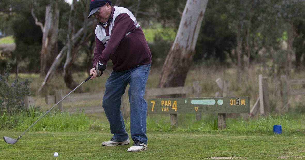 Teeing off: Brian Richards puts some power into this drive down the seventh fairway at Aradale during Saturday's stableford competition. Pictures: Peter Pickering