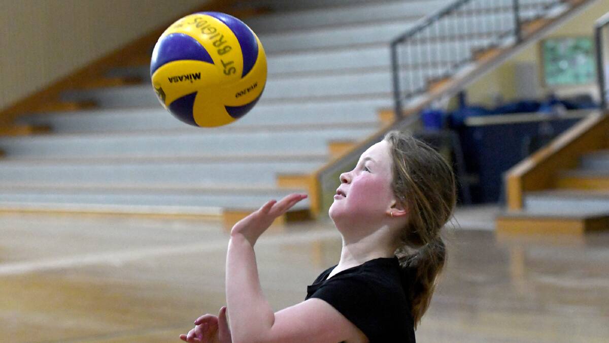 FOCUSED: Ava Jackson, 9, of Horsham learning volleyball skills during a holiday workshop with Wimmera Regional Sports Assembly earlier this month. 