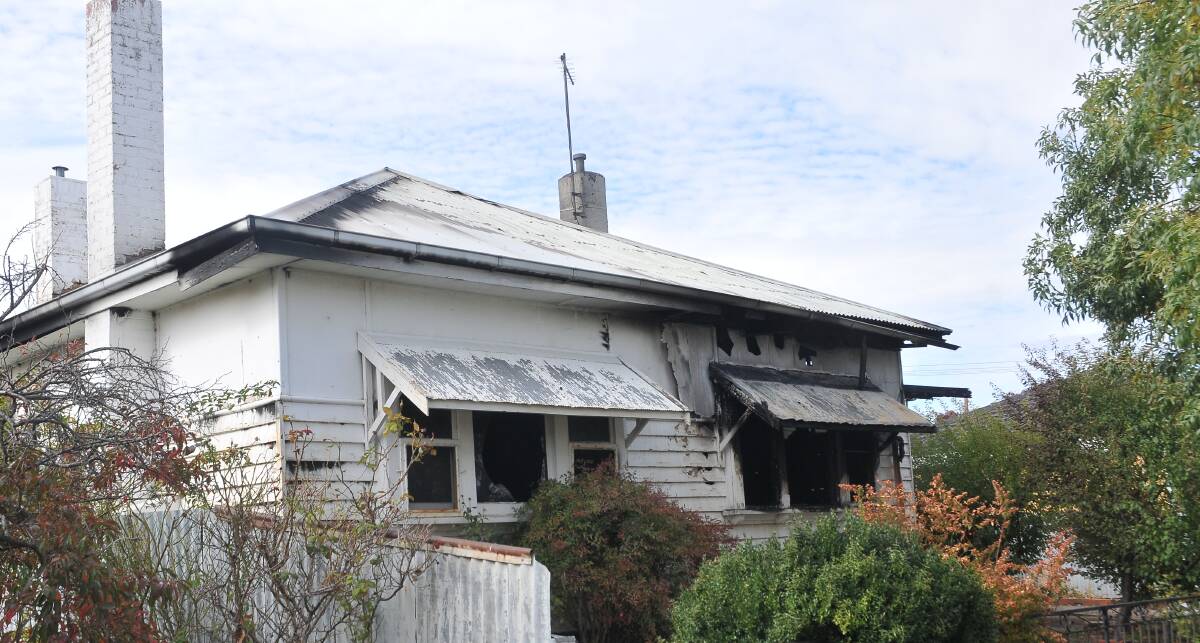 FIRE: A quick response from the CFA kept the blaze to the front half of the property. Picture: Anthony Piovesan