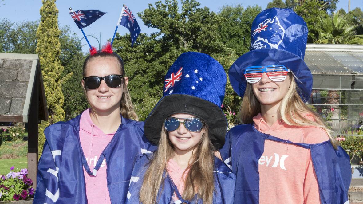 Friends Amy, Mia and Ella flying the Australia Day colours in Ararat in 2015. Australia Day celebrations for 2018 will start at Alexandra Oval Community Centre at midday.