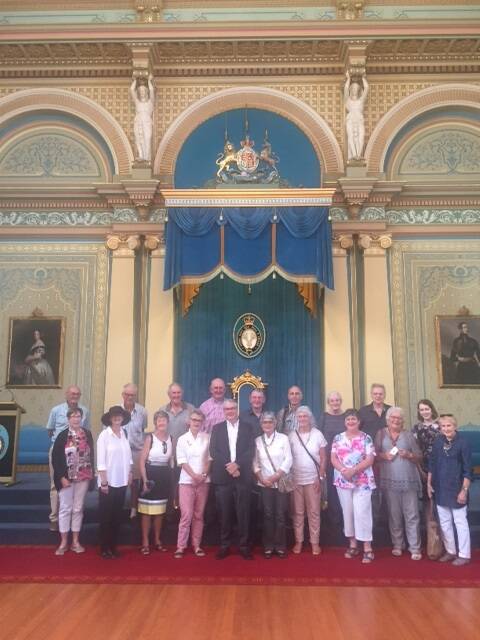 GOVERNOR: Members of Ararat U3A with Mr Tony Howard QC, the Governor's husband in the Royal Ballroom Government House. 