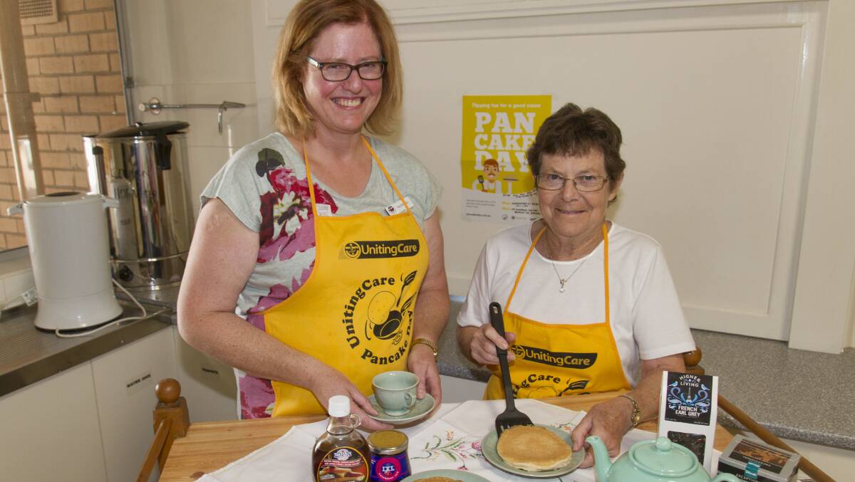 Phillipa Hale and Meryl Poole preparing for Ararat St Andrews Uniting Church Pancake Day on February 21. Picture: PETER PICKERING