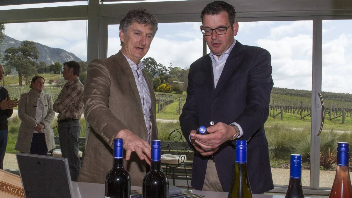 Mount Langi Ghiran winery general manager Damien Sheehan gives Premier Daniel Andrews a tour on Friday. Picture: PETER PICKERING