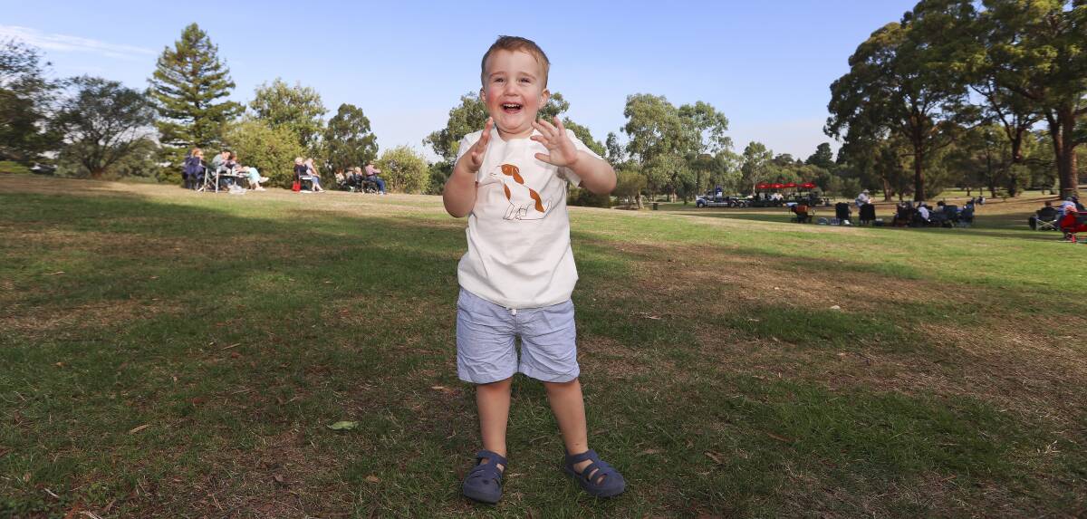 HAPPY: Harvey Porteous, 2, claps to music at Brass on the Grass at the weekend. Pictures: Luke Hemer