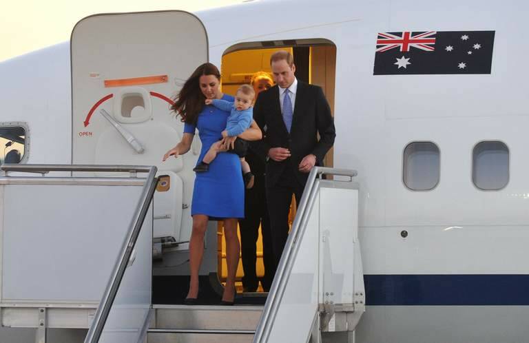 Catherine and William arrive in Australia with Prince George. Photo: Graham Tidy