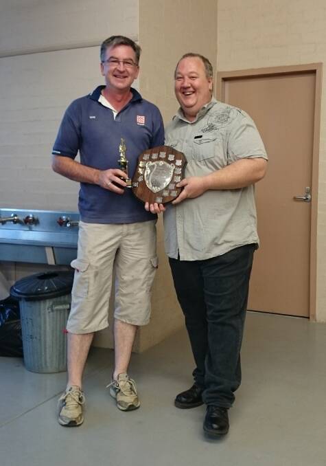 The George Sing Bandperson of the Year for 2014 was David Cosgriff, pictured being presented with his award by Ararat City Band president Scott Barrie.