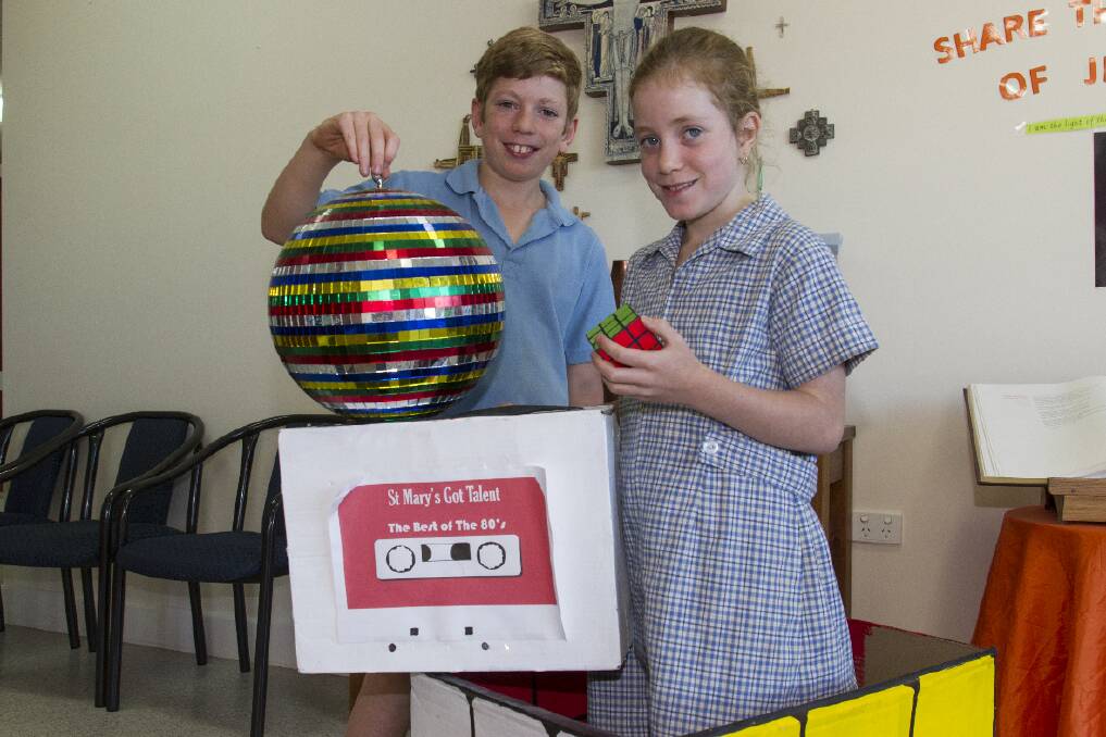 St Mary's Primary School students Nathan and Emily with some props for the talent night. Picture: PETER PICKERING