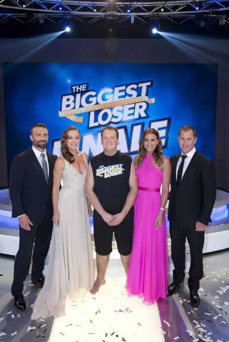 Craig Booby (centre) celebrates being crowned the winner of The Biggest Loser with trainers Steve ‘Commando’ Willis, Michelle Bridges, host Hayley Lewis and Shannon Ponton.
