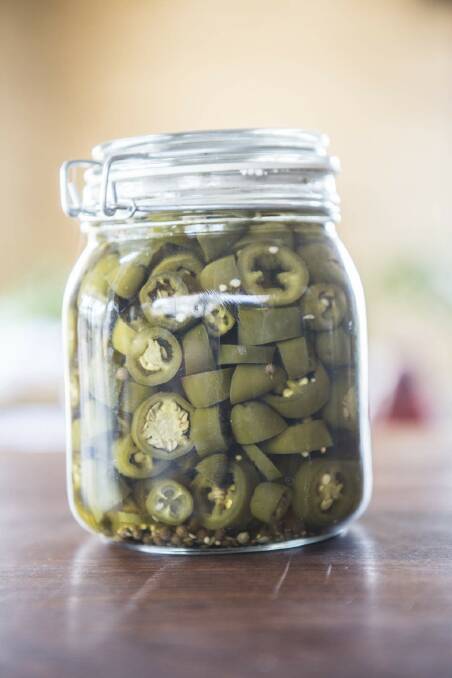 His home is ruled by home preserves - such as jalapenos, and plenty of pickled vegetables. Photo: Simon O'Dwyer