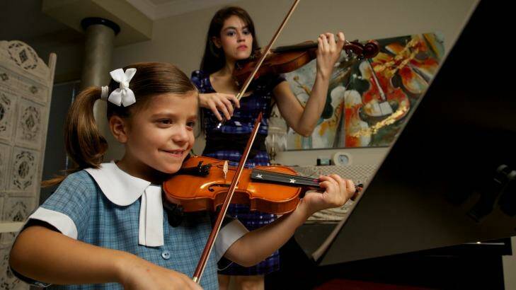 Six-year-old Natalia Zahorsky with her tutor Monica Rouvellas. Photo: Wolter Peeters