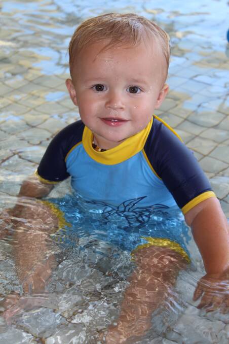 Emerson might have been too young to participate, but he was still happy to hit the water.