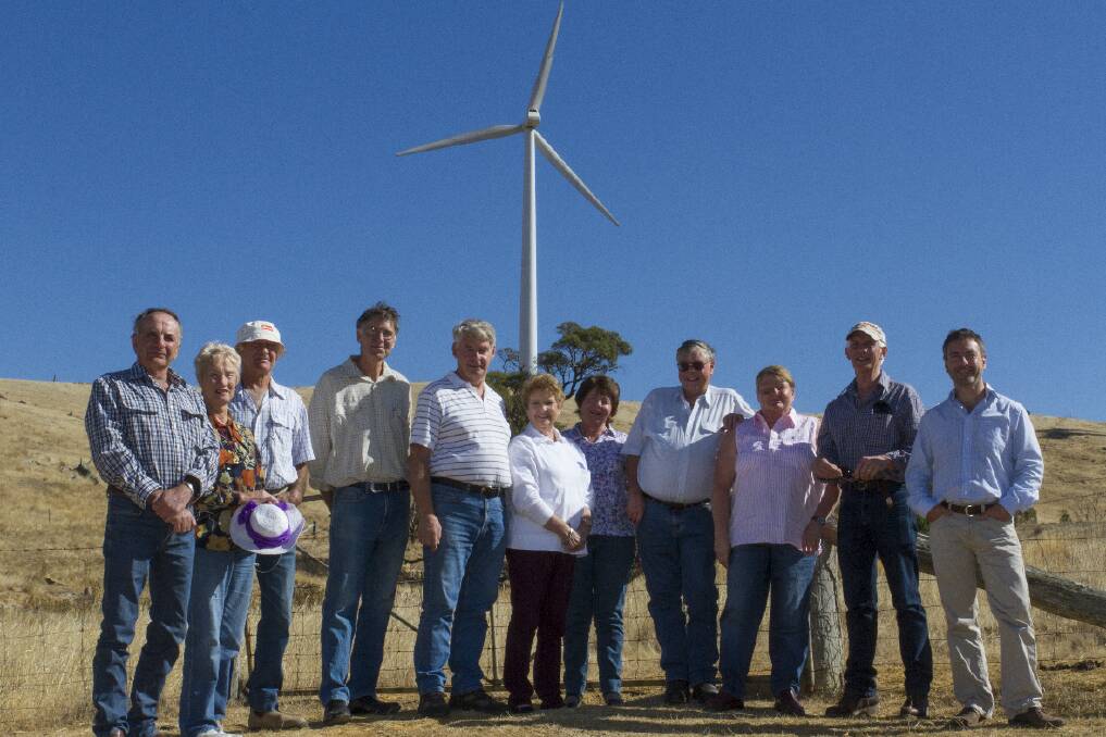 Chris Darbyshire, Jenny and Bernard Boatman, Mark McKew, Morrie and Gwenda Allgood, Helen Darbyshire, Graeme and Lynne Machonochie, Greg Carroll and Andrew Bray at the launch of the petition calling for the Federal Government to secure the Renewable Energy Target at the Challicum Hills Wind Farm. Picture: PETER PICKERING