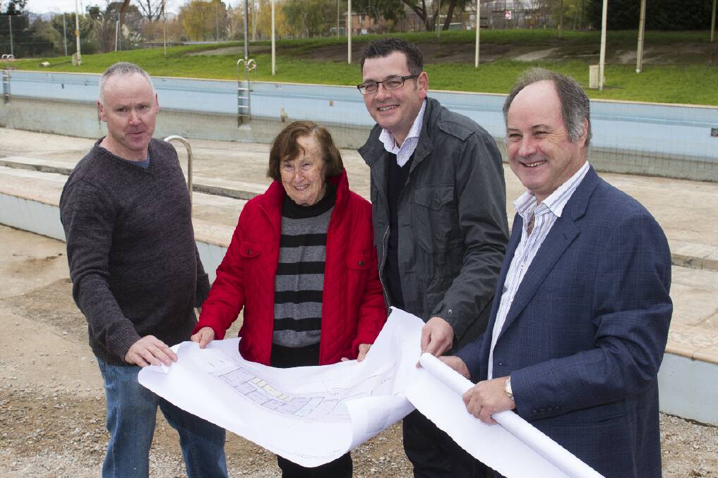 Pool redevelopment campaigner Ambrose Cashin, avid daily swimmer Monica Kapp, Premier Daniel Andrews and Ararat Rural City Mayor Cr Paul Hooper look over the plans for the pool works. Picture: PETER PICKERING