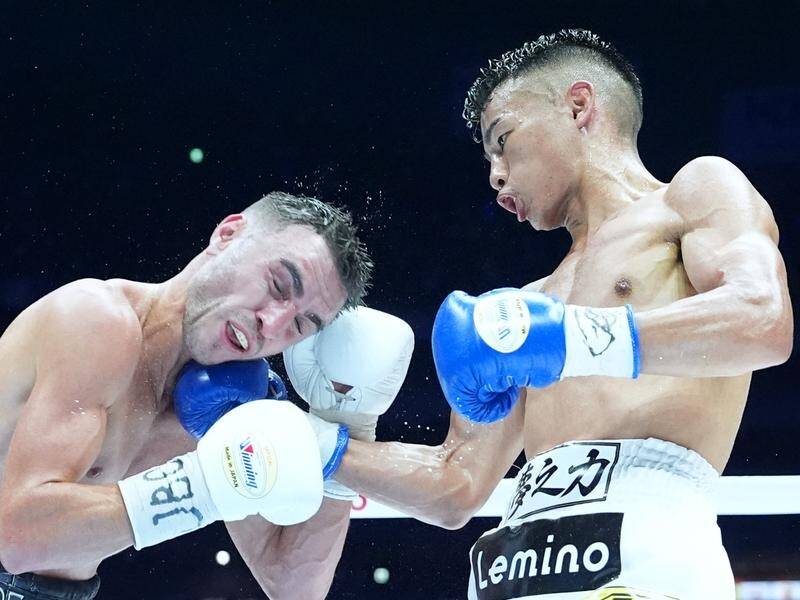 Australian Jason Moloney (left) lost the world title to Japanese rival Yoshiki Takei in Tokyo. (Supplied/AAP PHOTOS)