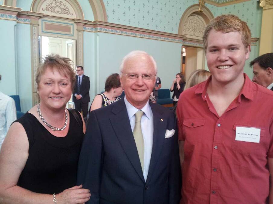 Karen McIntyre, Governor Alex Chernov and Nick McIntyre at Government House in Melbourne where Nick was presented with his award.
