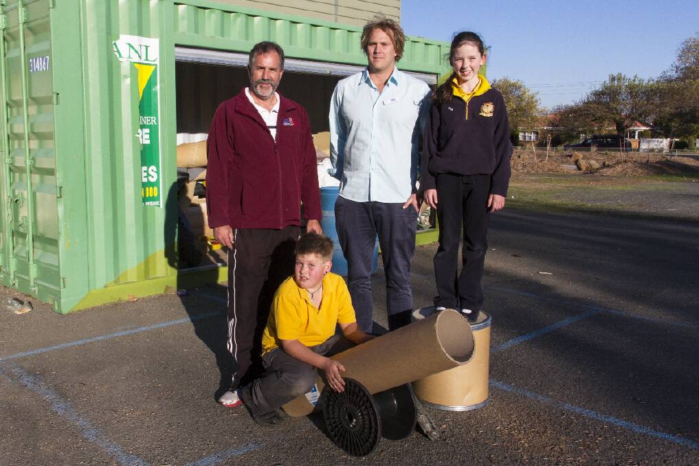 Ararat 800 Primary School students Bly and Tahnee show Michael Spalding from Ararat Community Enterprise and assistant principal Adrian Pilgrim some items from the Play for Life Pod.  
 Picture: PETER PICKERING
