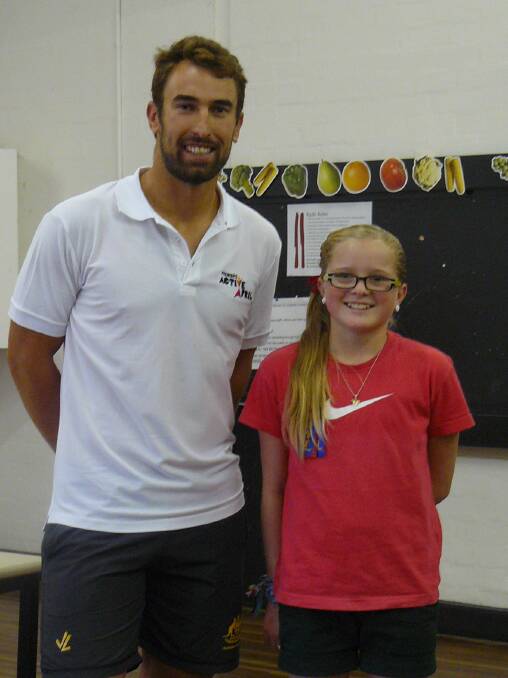 Elite Australian rower John Linke is pictured with grade six Ararat North Primary school captain Khloe.