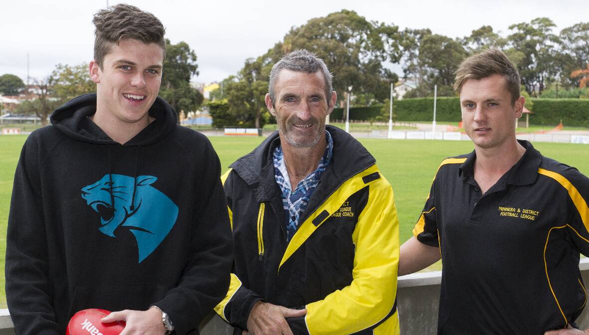 Mick Jennings (centre) will return for a second year as coach of the Mininera and District Football League team in tomorrow’s
WorkSafe VCFL Country Championship match against Kyabram and District Football League. Jennings is pictured with two of this year’s interleague representatives, Moyston/Willaura’s Rhys Cronin (left) and Aaron Williams from Great Western. Picture: PETER PICKERING