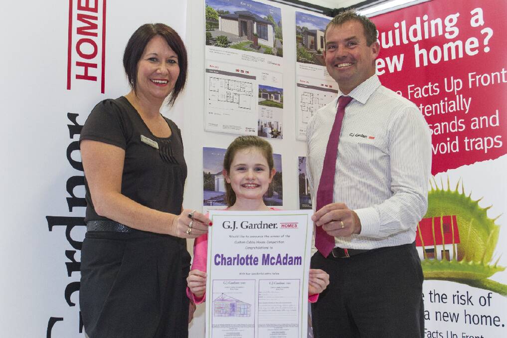 GJ Gardner Homes' Sally and Ash Heard with competition winner Charlotte.
