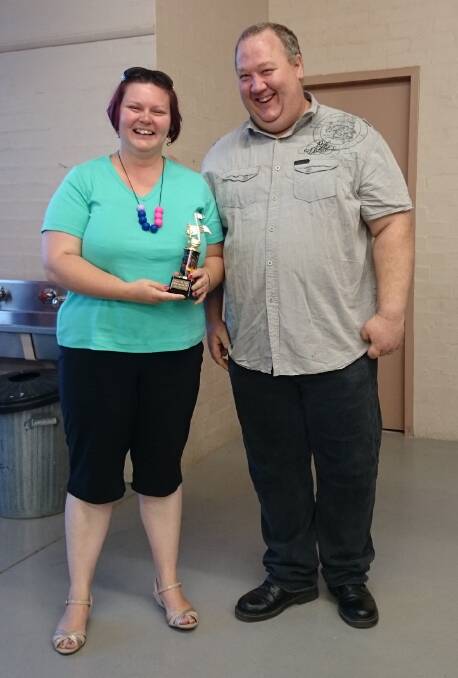 Amy Stevens received the Most Improved award from president Scott Barrie.