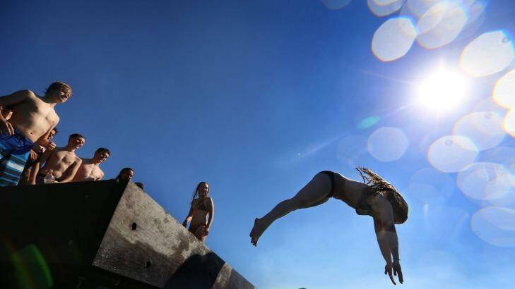 Sunlovers and swimmers enjoy the balmy weather at Redleaf Beach in Sydney's Eastern Suburbs as temeperatures rise into the thirties across the city  Photo: James Alcock