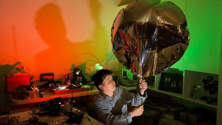 Andy Nguyen is a network engineer by day - but in his spare time he gets into the 'balloon scene'. Photo: Jason South