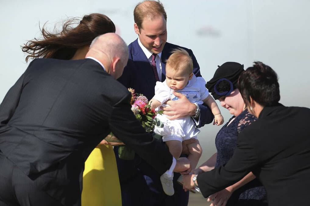 His Royal Highness Prince William, Duke of Cambridge holding his son Prince George arriving at Sydney Airport. Photo: Kate Geraghty