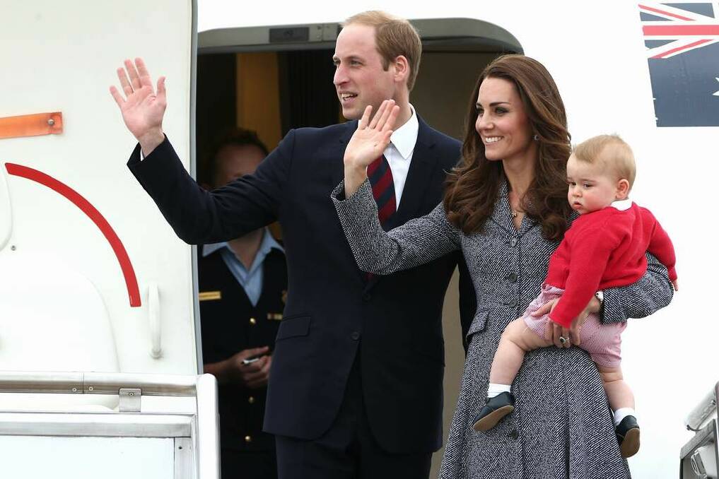 Prince George of Cambridge, Catherine, Duchess of Cambridge and Prince William, Duke of Cambridge, board their plane as they depart Canberra. Photo: Alex Ellinghausen
