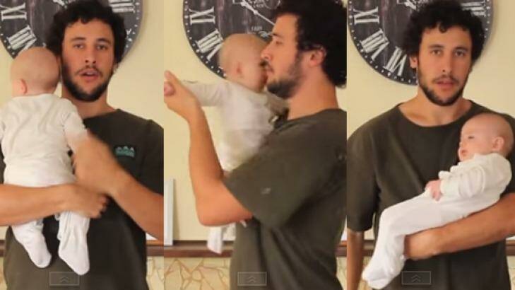 Jordan Watson demonstrating a few of the different baby holds.  Photo: YouTube