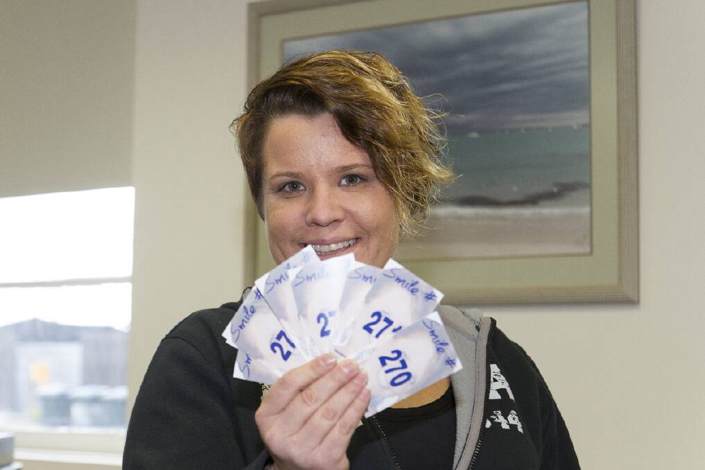 Sharon Basset with her smile cards, which have already touched hundreds of 
people. 