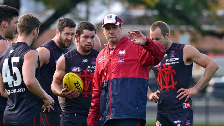 Undecided: Paul Roos with his players. Photo: Justin McManus