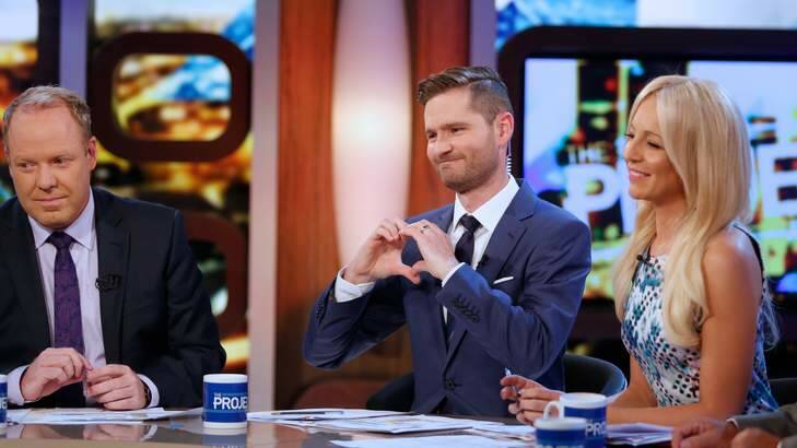 Charlie Pickering (centre) shares the love with Peter Helliar and Carrie Bickmore during his last turn as co-host of <i>The Project</i>. Photo: Eddie Jim