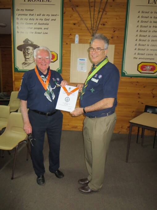 Assistant Chief Commissioner - Development of Scouts Simon Marks presenting 2nd Ararat Scout Group Leader in Charge John Wilson with his Distinguished Service Award.