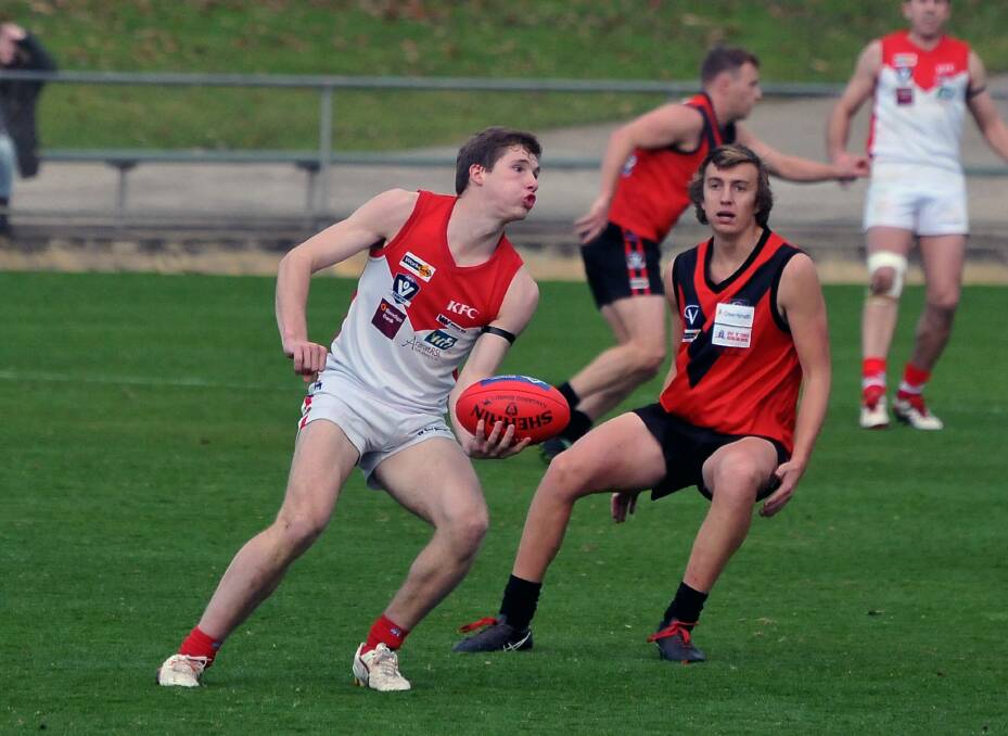 Midfielder Harry Ganley ready to fire off a handball during the Rats’ clash with rivals Stawell on Saturday at Central Park. Ararat produced one of its most consistent performances so far this season to defeat the Warriors by 72 points. Picture: MARK McMILLAN
