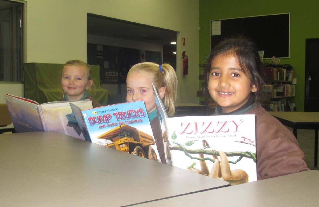 Layla, Natarshka and Hiba love reading books.