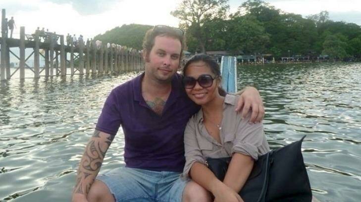 Phil Blackwood and his fiance, Noemi Almo. He is  in a Yangon prison after he used a psychedelic image of Buddha  to promote a cheap drinks night at the bar he managed.