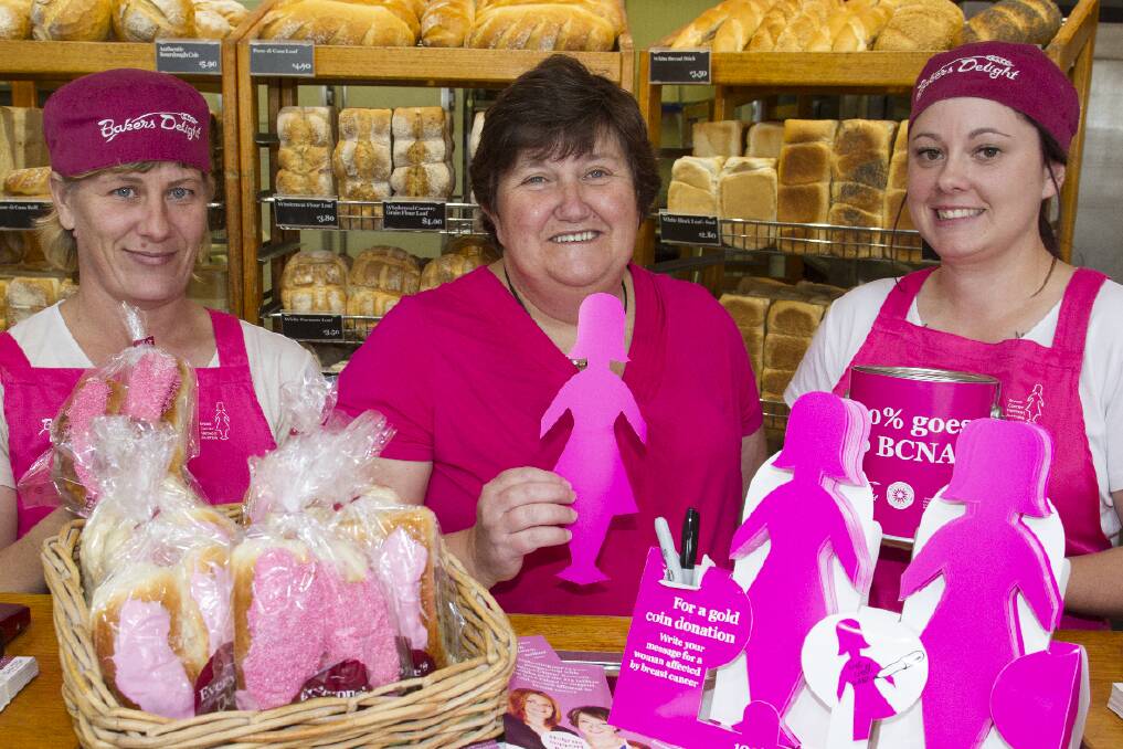 Breast cancer survivor Linda Nyikos (centre) joins Ararat Bakers Delight staff Melissa Gillingham and Jessica Welsh as the annual Pink Bun fundraising campaign kicks off. Picture: PETER PICKERING