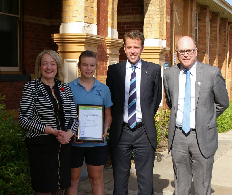 Alice Culling (second from left) is congratulated on receiving the Local Sporting Champions Grant by Liberal candidate for Ripon Louise Staley, Federal Member for Wannon Dan Tehan and Marian College principal John Crowley.