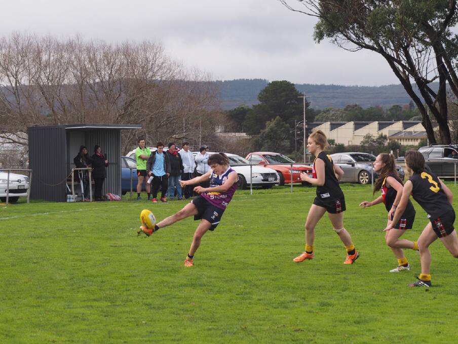 Storm player Mikaela Turvey sends the ball down the field. Turvey was named Ararat s best in the 68-point win. Picture: CONTRIBUTED