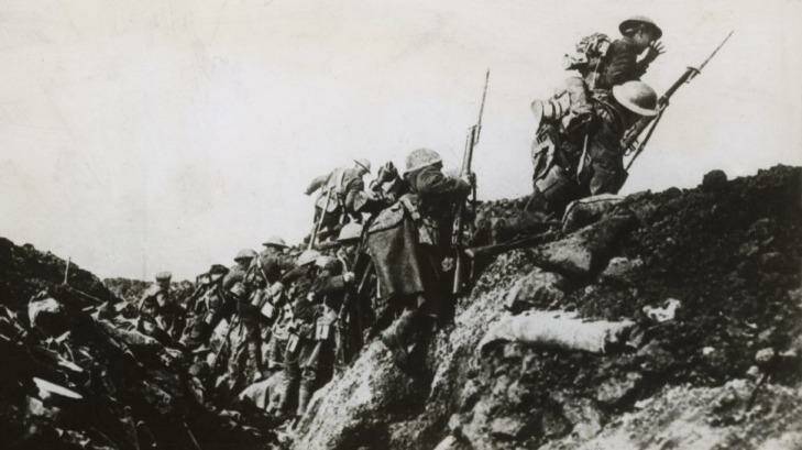 Australian infantrymen on the Western Front clamber over the top of a trench in France on a bayonet charge towards the German lines. Photo: Newcastle Herald Library